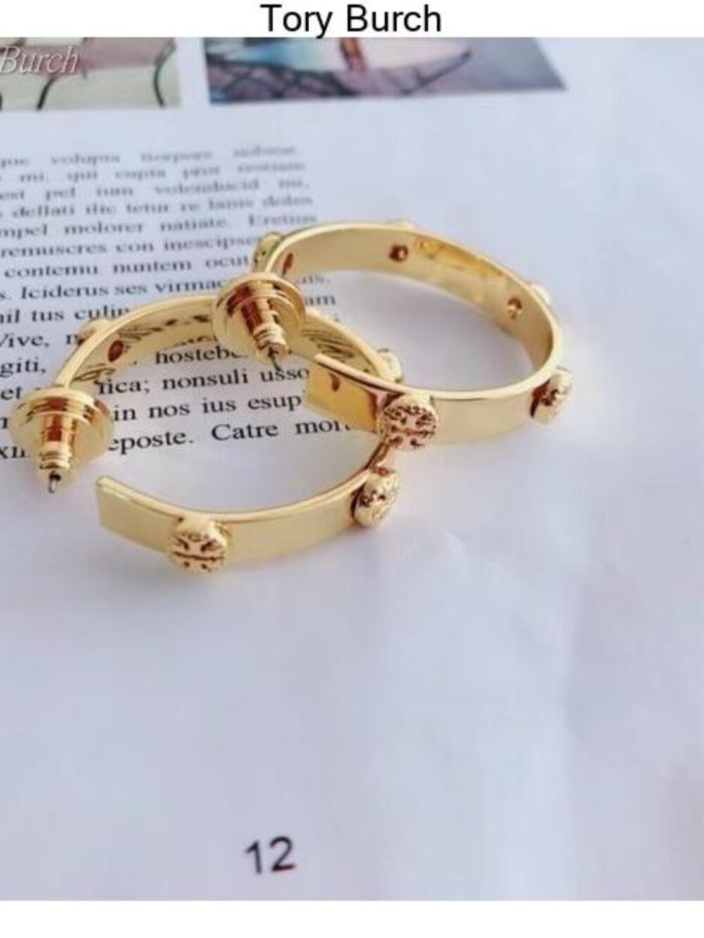 Gold Hoop Earrings with Decorative Stud Accents